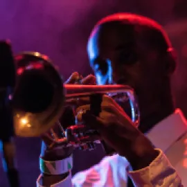A man plays the trumpet at The Blue Room in Kansas City