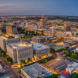 Aerial view of the Fresno, California skyline at dusk.