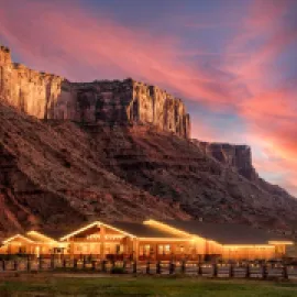 Red Cliffs Lodge Moab exterior at sunset