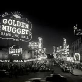 Fremont Street, 1954, with Golden Nugget neon sign in foreground.