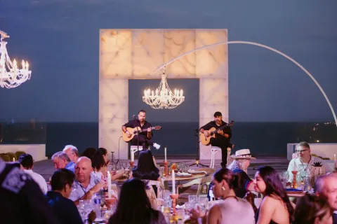Musicians play at Meetings Today LIVE! Corporate/Incentive Welcome Reception. 