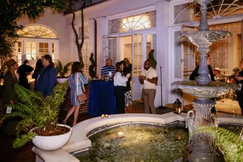 The opening night reception was held in the New Orleans courtyard at the Royal Sonesta. 