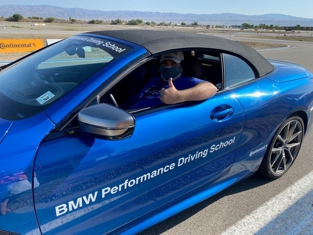 Tyler Davidson prepares to drive a BMW at the BMW Performance Driving School.