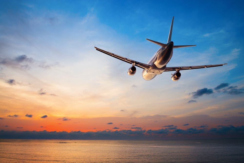 plane flying over water