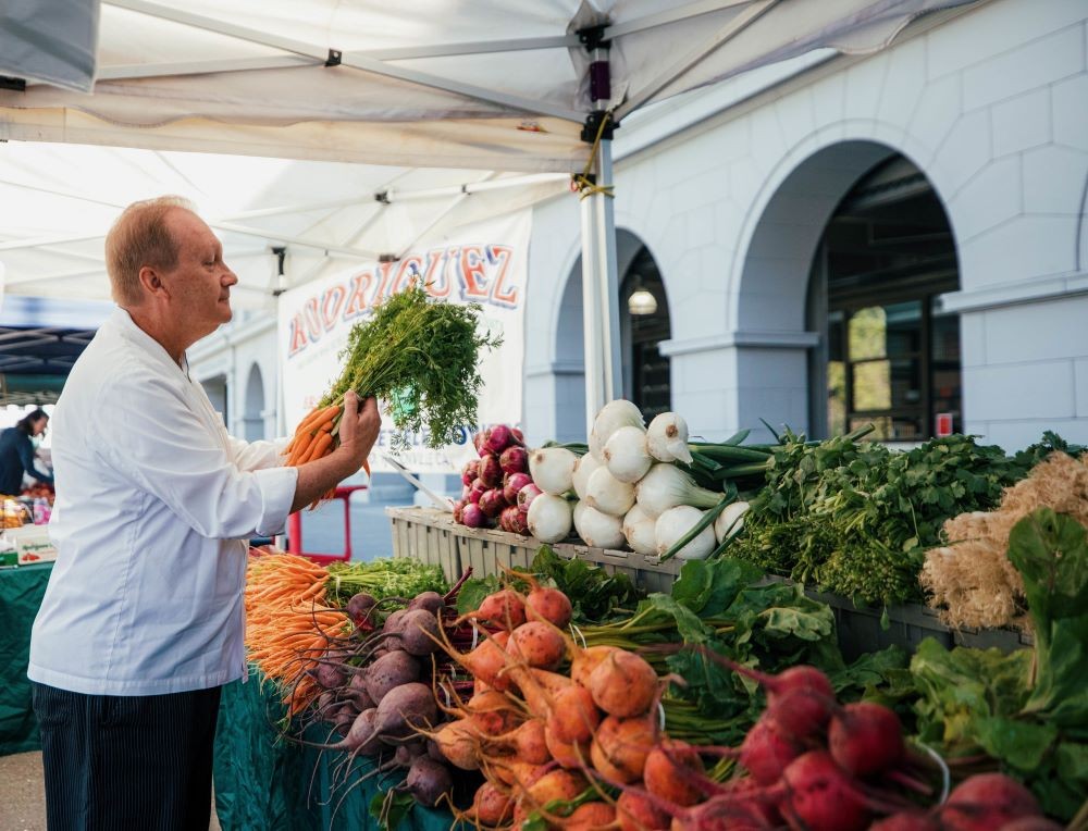 Executive Chef Victor Litkewycz, Hyatt Regency San Francisco, shopping at farmers market.