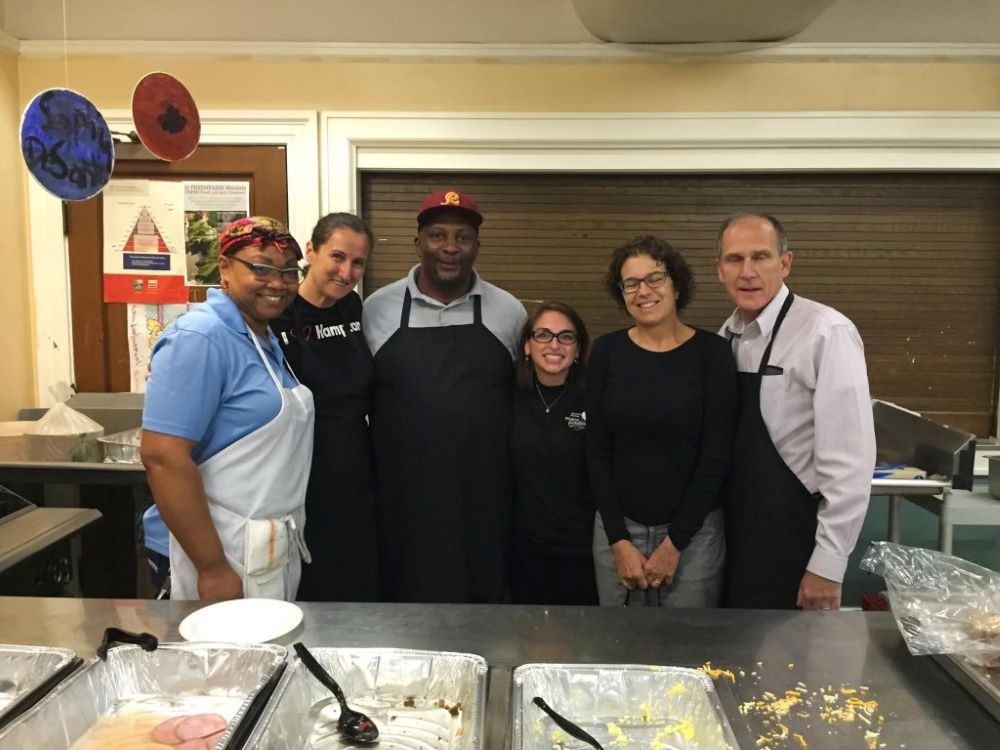 Corporate volunteers cooked and served breakfast at Miriam’s Kitchen
