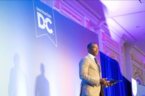 Photo of Elliott L. Ferguson II, president and CEO, Destination DC, speaking at Marketing Outlook Meeting 2022. at 