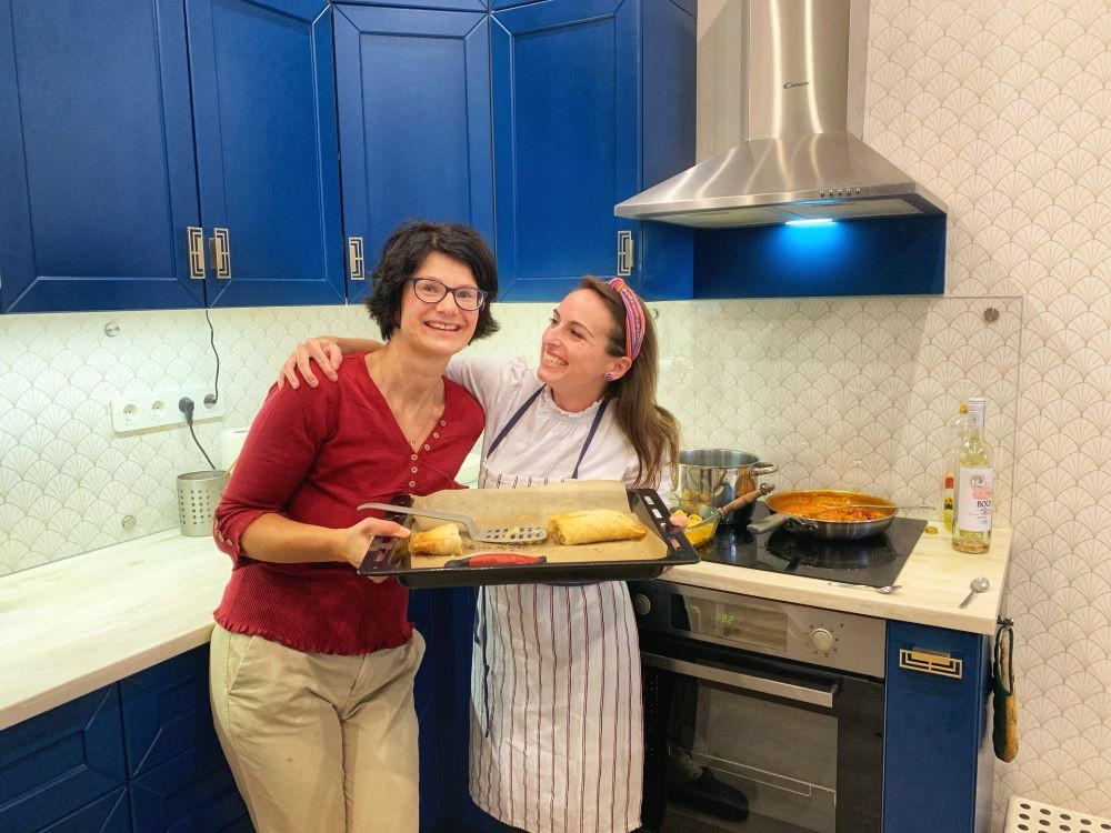 Learning to cook chicken paprikash from local chef, Brigi, in Budapest, Hungary