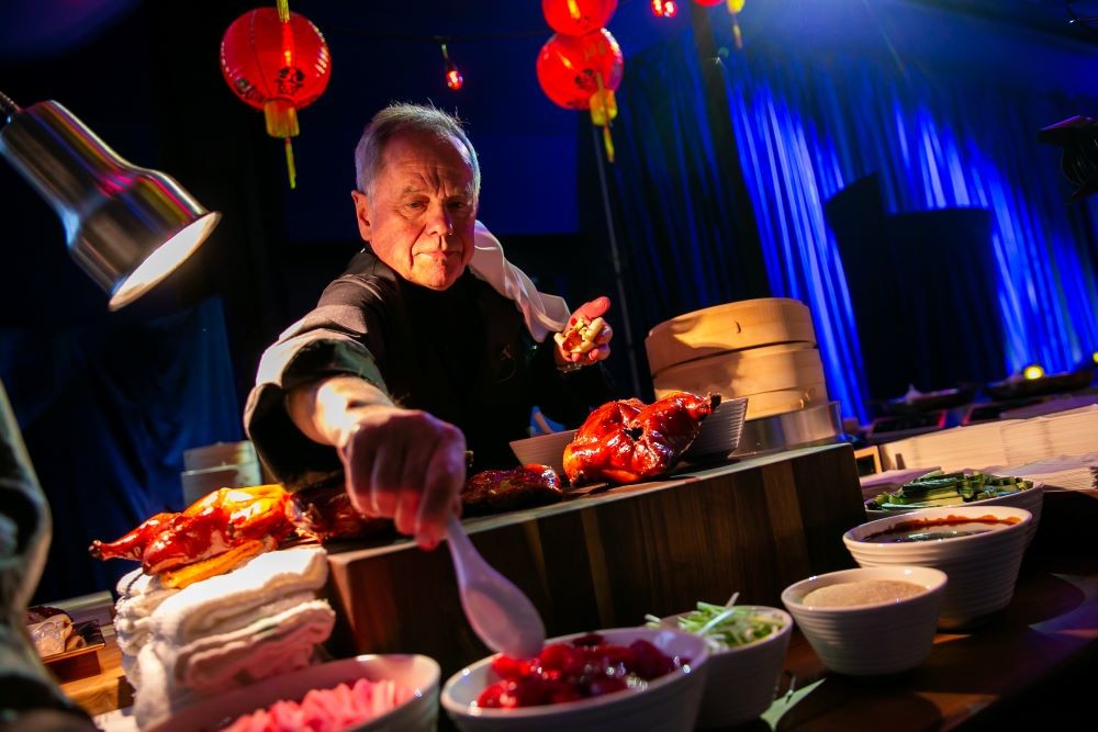 Photo of Wolfgang Puck cooking at Atlanta's Georgia Aquarium.