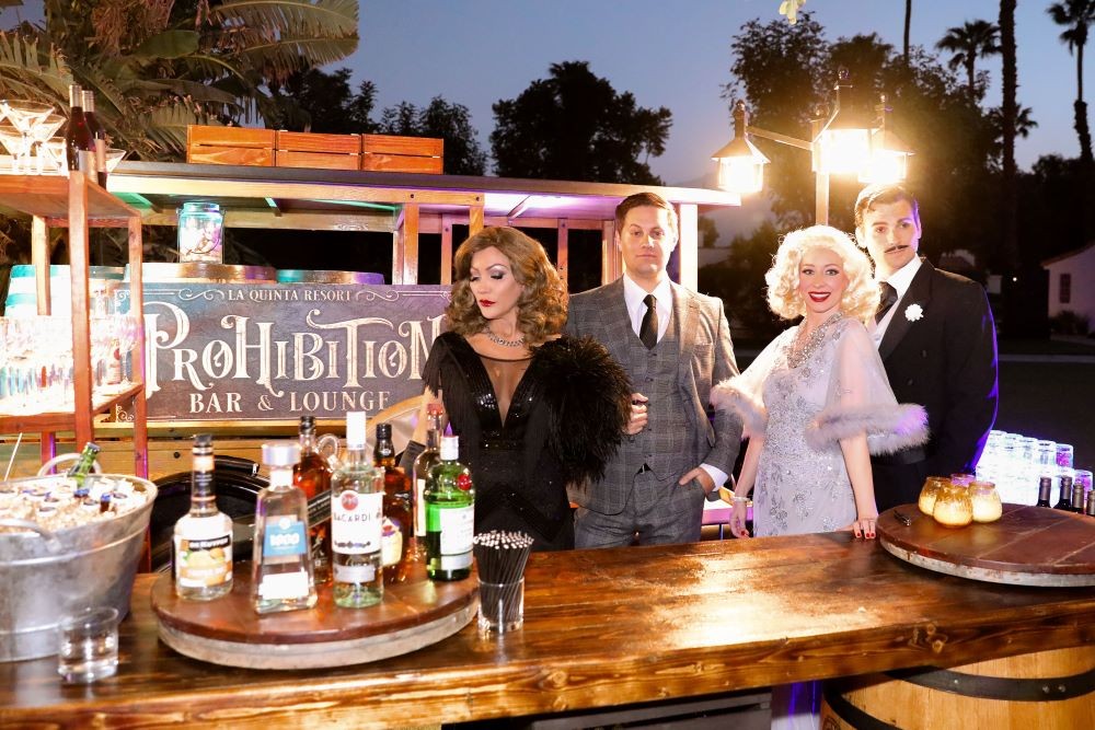 Hollywood characters pose in front of Prohibition Bar at La Quinta Resort & Club. 