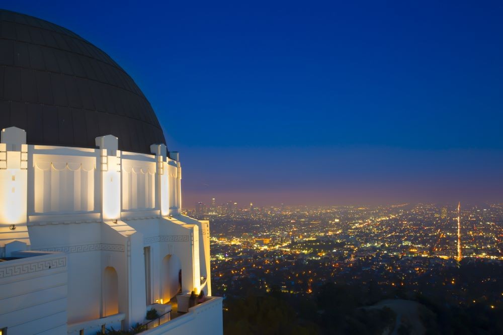 Griffith Observatory Dome and cityscape at night