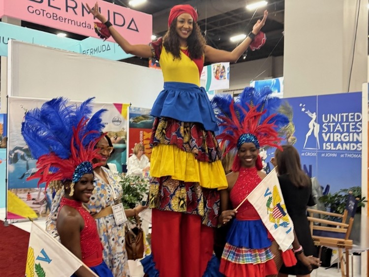 Stilt Dancers at the Visit U.S. Virgin Islands Booth