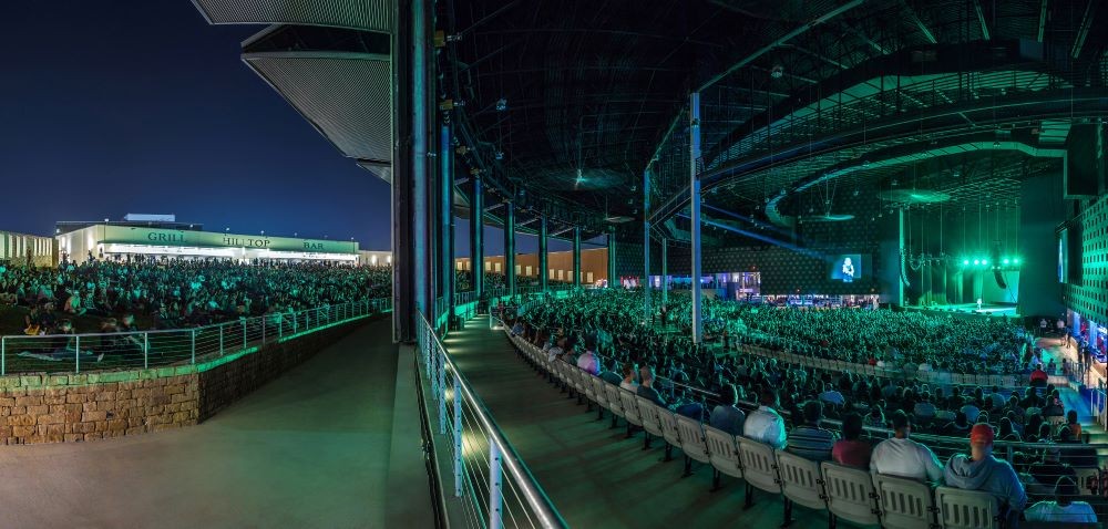 Photo of crowd at night at The Pavilion at Toyota Music Factory.