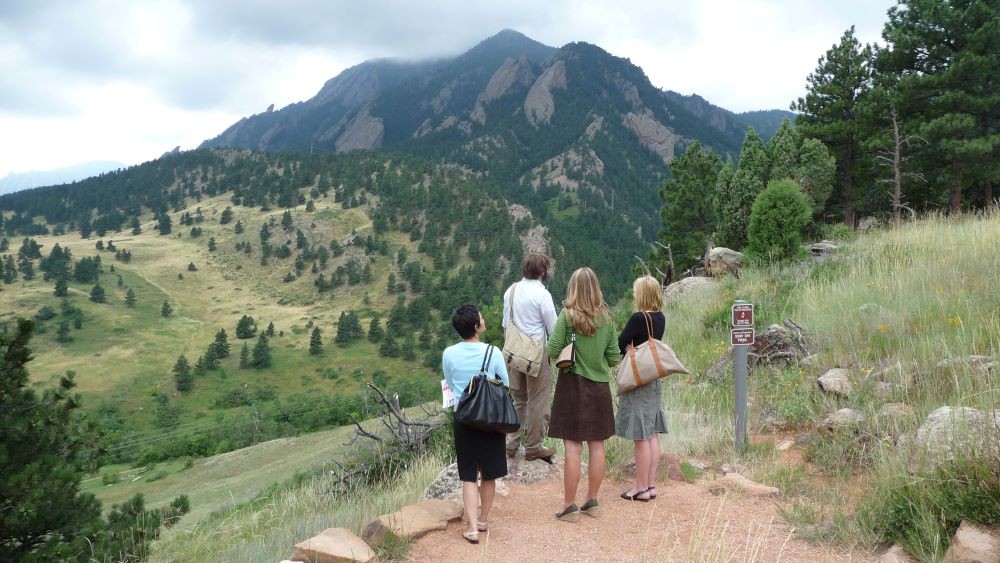 Photo of people looking out over the NCAR Weather Trail Overlook in Boulder