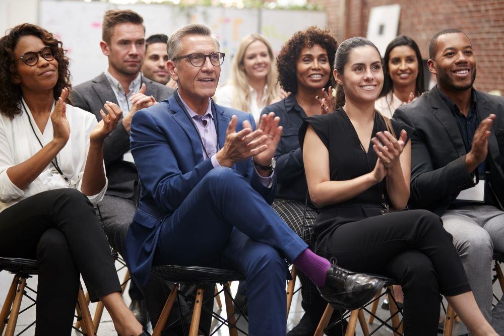 Group of attendees sitting in the audience
