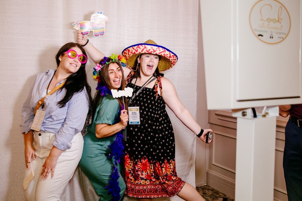 Attendees pose for a photo at Hyatt Regency Hill Country Resort and Spa