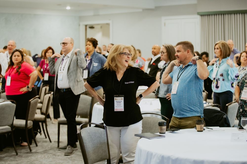 Attendees having fun during Meetings Today LIVE! education session