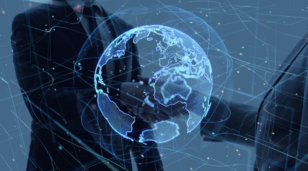 Globe graphic with hands shaking