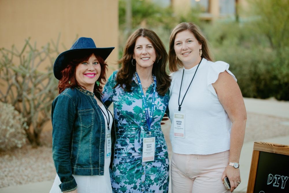 Attendees smiling at JW Marriott Starr Pass. Credit: Wandering Maverick Photo+Film