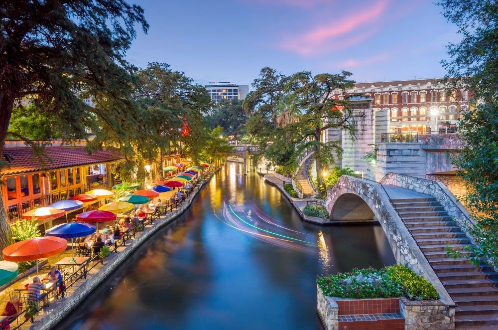 Photo of the San Antonio River Walk at dusk.
