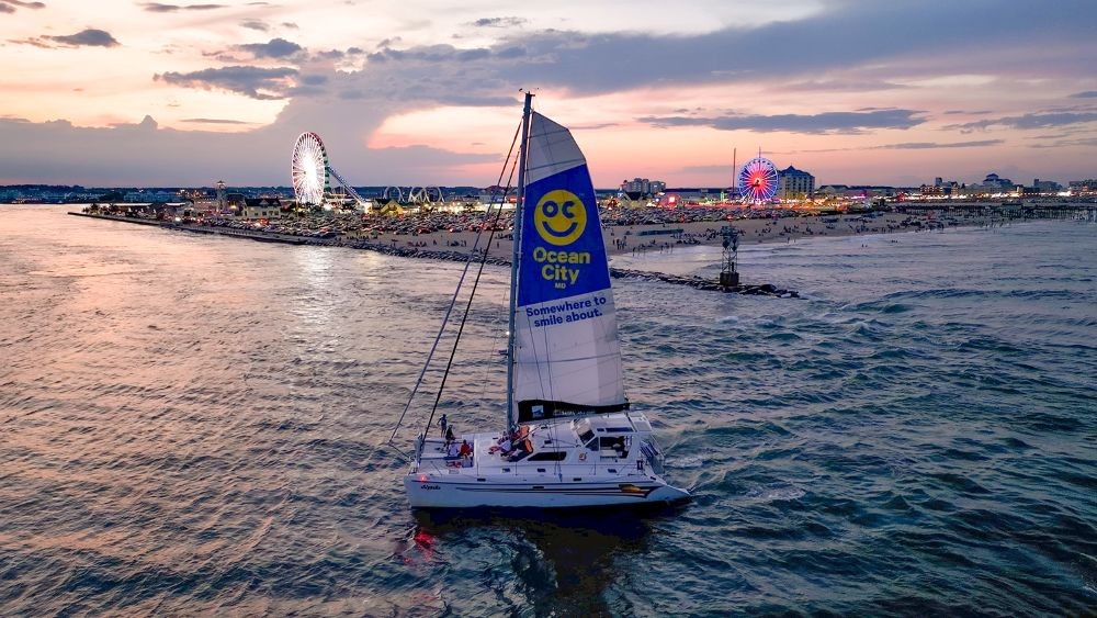 Ocean City sailboat in front of shoreline. Credit: Ocean City