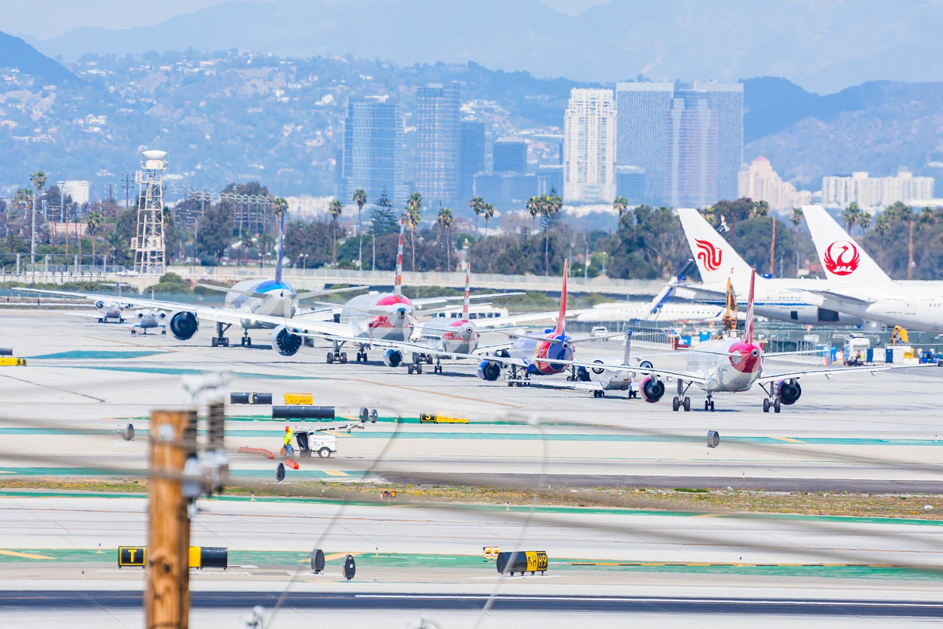 line of planes on tarmac