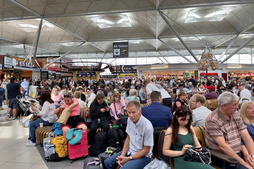 image of travelers stuck in an airport