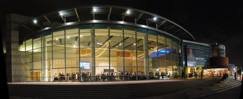 Photo of JANM Pavilion exterior at night.