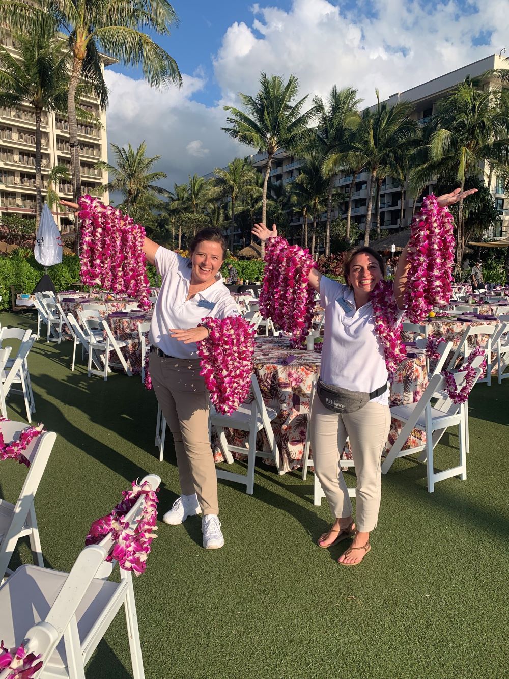 Prepping a special luau event in Maui by greeting guests with a “makana” (which means gift in Hawaiian) of leis (with event planner Laura Hammarstrom)