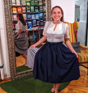 Ashley Lawson tryingon a Dirndl in Salzburg, Austria.