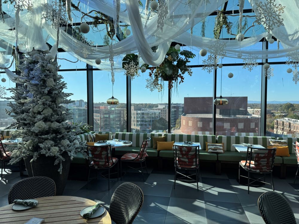 Photo of Juniper restaurant at AC hotel in Greensville, decked out in holiday decor.