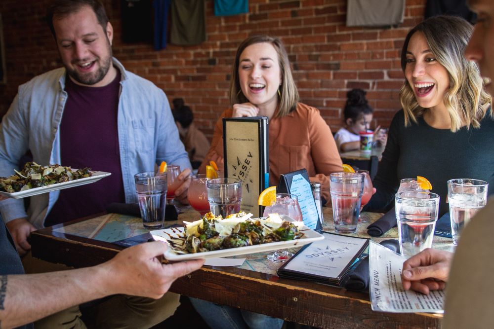 Eating at a restaurant in Colorado Springs with Rocky Mountain Foot Tours