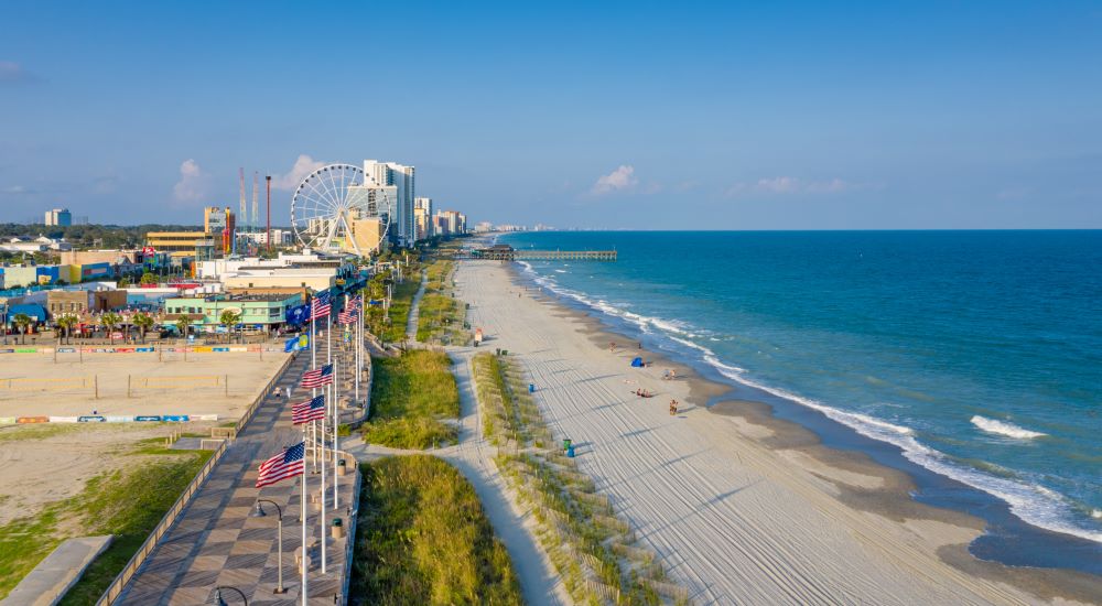 Aerial view of myrtle beach including ferris wheel Aerial view of myrtle beach including ferris wheel
