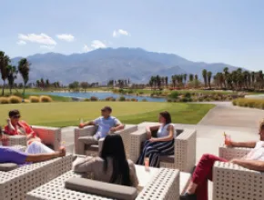 Group of attendees meeting outside in Palm Springs