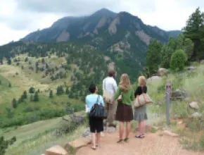 Photo of people looking out over the NCAR Weather Trail Overlook in Boulder